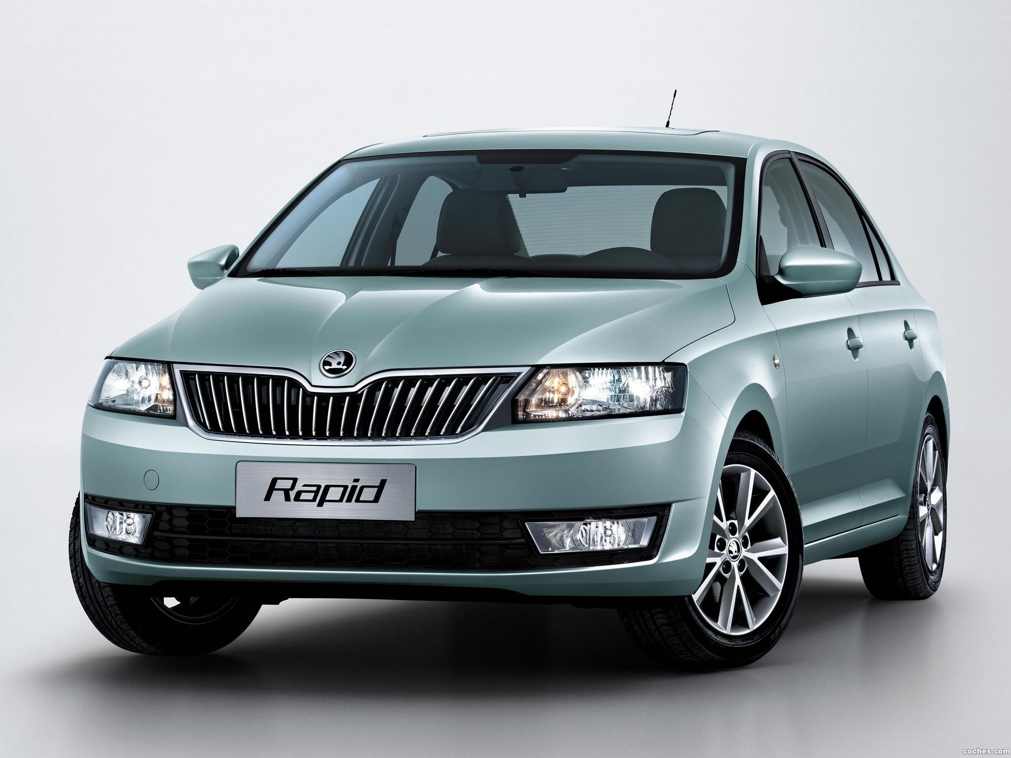 Кто производит шкоду. Машина Skoda Rapid. Шкода Рапид 2013. Шкода Рапид 2013-2014. Авто Шкода Рапид седан.